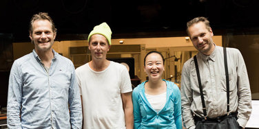 Jasmine Chen in studio with three males, all standing up